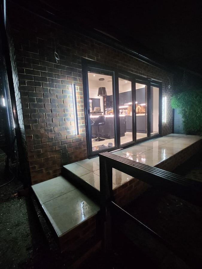 Dark Open-Plan Kitchen — Leeds project by Alwoodley Building